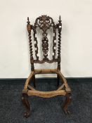 A carved Victorian mahogany bedroom chair (re-upholstery project)