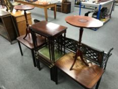 A pair of mahogany wine tables and a nest of three tables