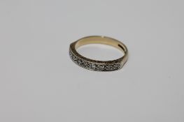 A 9ct gold diamond half eternity ring, size O, 2.6g.