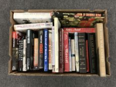 A box of books relating to war