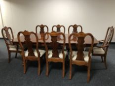 A ten piece dining room suite, comprising of low sideboard,