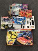A boxed Meccano space base set, together with a boxed Scalectrix set (no cars),