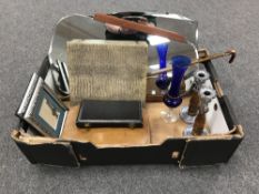A box containing a frameless bevel edge mirror together with a 1970's mirror, cased cutlery,