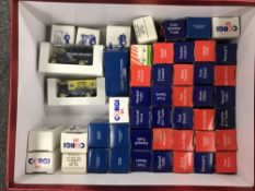 A box containing approximately forty eight boxed Corgi miniature die cast vehicles