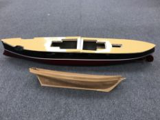Two model boat hulls