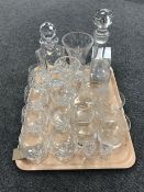 A tray of assorted glassware including Bohemian crystal decanter, etched glass decanter,