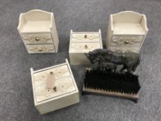 Four miniature two drawer shabby chic chests and a cast metal boot scraper