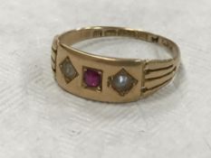 A 15ct gold ruby and pearl ring CONDITION REPORT: The ring weighs 2.8g.