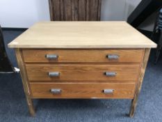 An oak three drawer plan chest