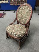 An antique pine rocking chair