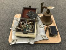 A brass ships bell together with a trinket box containing costume jewellery,