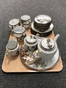 A tray containing a twenty one piece Japanese egg shell tea service, by Hayasi,