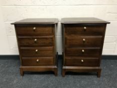 A pair of Stag Minstrel bedside chests