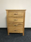 A contemporary four drawer chest