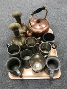 A tray containing pewter and painted tankards,
