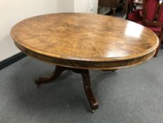 A Victorian burr walnut oval breakfast table CONDITION REPORT: Minor surface wear