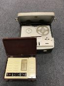 A cased mid 20th century Vidor radio,