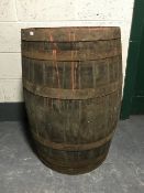 A coopered oak whiskey barrel