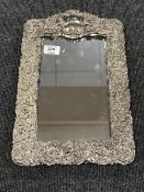 An ornate dressing table easel mirror