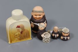 A Royal Doulton china flask, together with three Goebel figures, 'Monks',