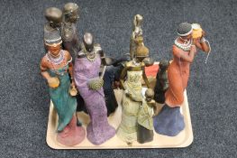 A tray containing a quantity of contemporary African figures,