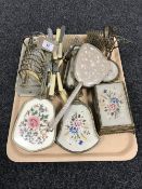 A tray of plated toast rack on stand, fish cutlery,