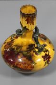 A Madras ware vase with flower decoration,