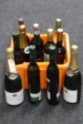 A crate of three bottles of champagne,