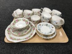A tray containing seventeen pieces of Colclough tea china, pattern number 7132,