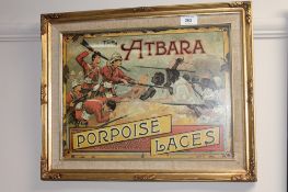 A gilt framed advertisement,