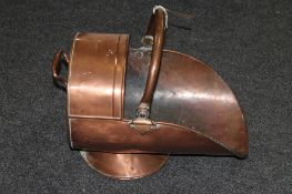 An antique copper coal helmet