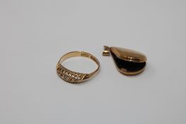 An 18ct gold ring set with rose-cut diamond chips, 1.8g, together with a yellow metal locket.