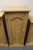 A reclaimed pine single door cupboard,