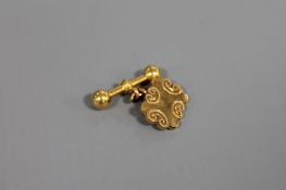 A cufflink stamped 22ct, 5.