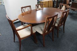 An oval G plan extending dining table, fitted with a leaf,