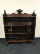 A set of early twentieth century open bookshelves