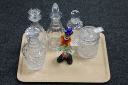 A tray containing a Murano glass clown,