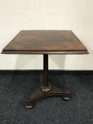 An early twentieth century pedestal pub table