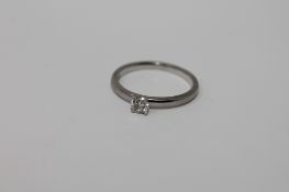 A platinum diamond solitaire ring,