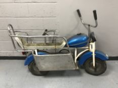 A fairground carousel motorbike in the form of a Harley Davidson