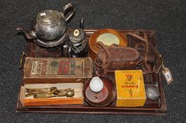 An antique carved mahogany twin handled serving tray containing a plated tea pot on stand with