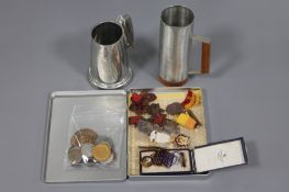 A collection of military medals, including a boxed Distinguished Service medal,