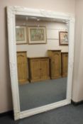 A cream Victorian style mirror 123 cm x 183 cm.