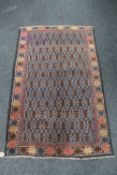 An old Balouchi rug,
