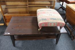 A stained contemporary pine two tier coffee table,