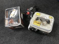 A petrol generator together with a boxed challenge circular saw and a performance electric planer