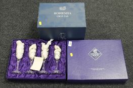 A boxed set of four Edinburgh Crystal champagne flutes,