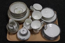 A tray containing twenty two pieces of Royal Doulton Saraband tea china,