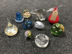 A collection of ten assorted glass paperweights including Mdina,