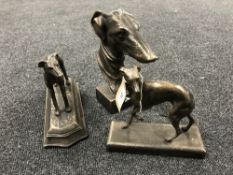Three cast metal figures of greyhounds